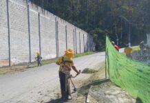 Serviços de roçagem e capinagem transformam o entorno do Condomínio Nova Esperança.
